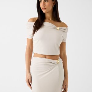 Off-shoulder draped knit top